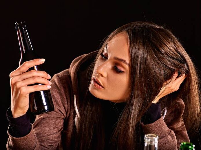 Girl with a bottle like getting rid of addiction